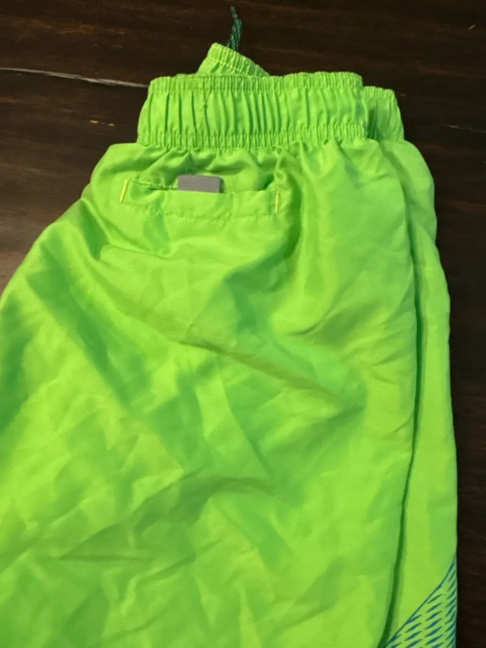 Nike Neon Green Kids' Athletic lined swim Shorts with Blue Swoosh size xl
